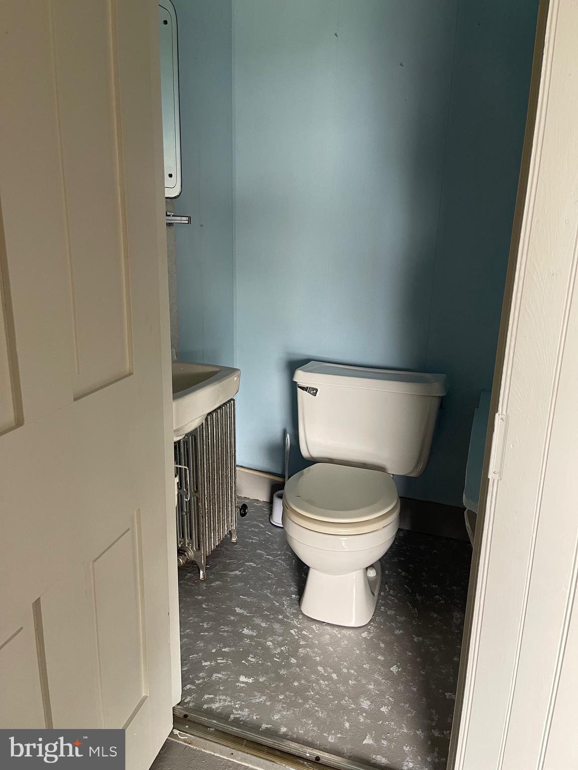 1083 Georgetown Road Paradise, PA 17562 - Photo 14 of 14 a white toilet sitting next to a shower