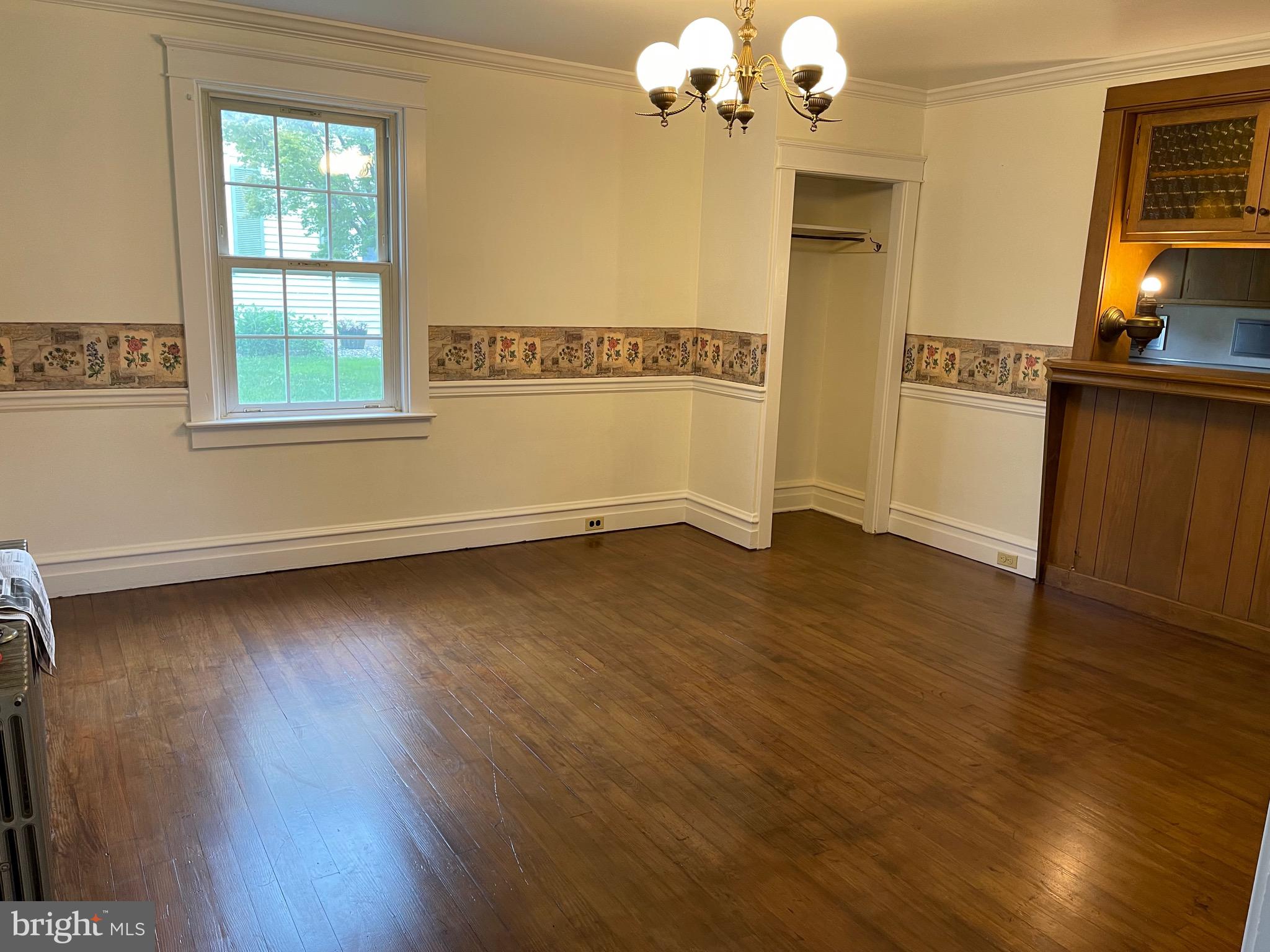 1083 Georgetown Road Paradise, PA 17562 - Photo 10 of 14 a view of a room with wooden floor and staircase