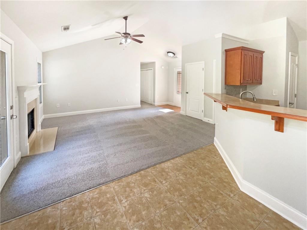 189 Hampton Drive Jefferson, GA 30549 - Photo 14 of 36 a view of a kitchen with a sink and a refrigerator