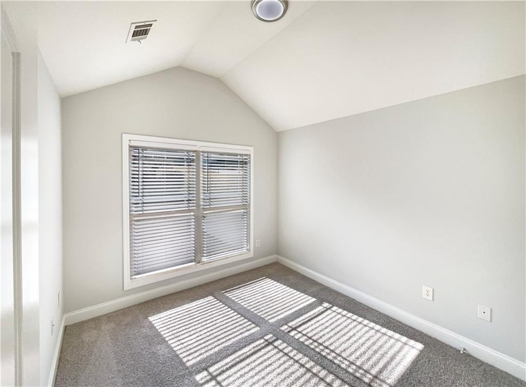 189 Hampton Drive Jefferson, GA 30549 - Photo 21 of 36 a view of wooden floor and windows in a room