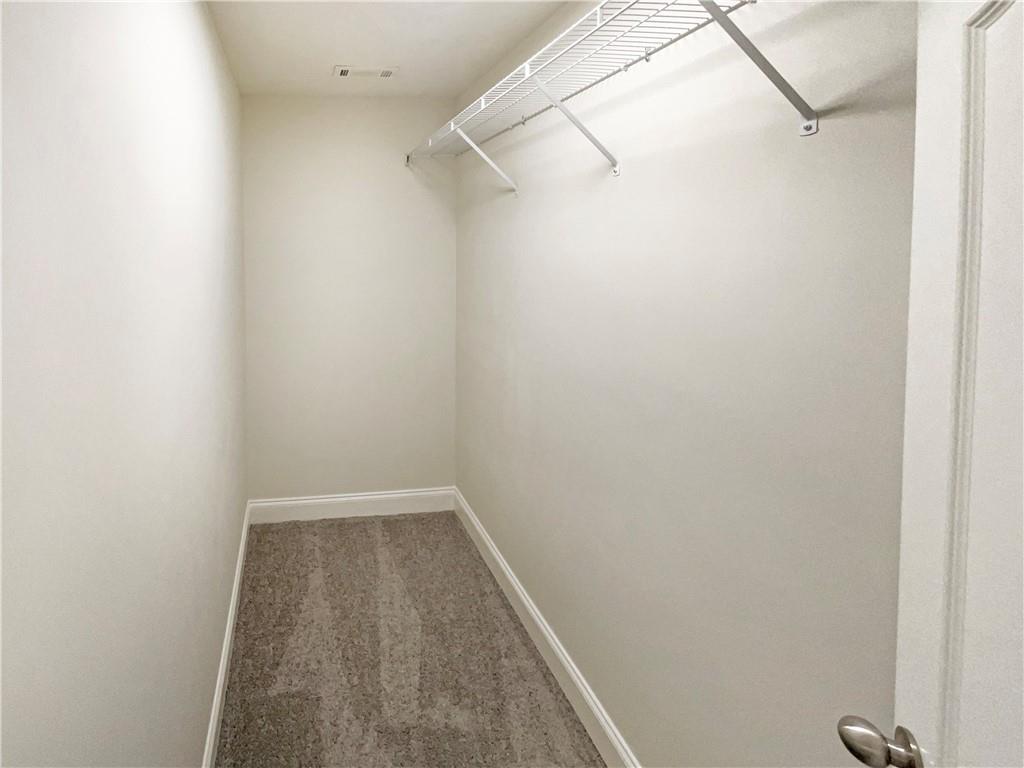 189 Hampton Drive Jefferson, GA 30549 - Photo 22 of 36 a view of small space with racks on the wall