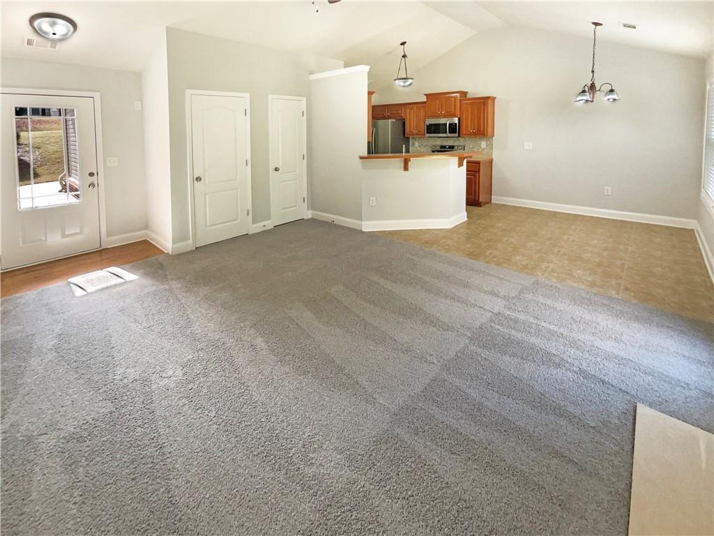 189 Hampton Drive Jefferson, GA 30549 - Photo 8 of 36 a view of a kitchen with a sink and a window
