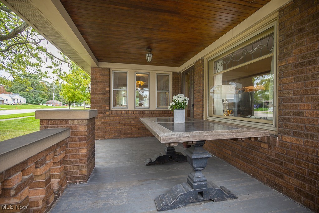 7070 Ridge Road Parma, OH 44129 - Photo 24 of 28 View of patio with a porch
