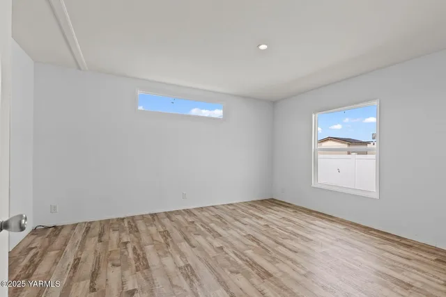 a view of an empty room and window