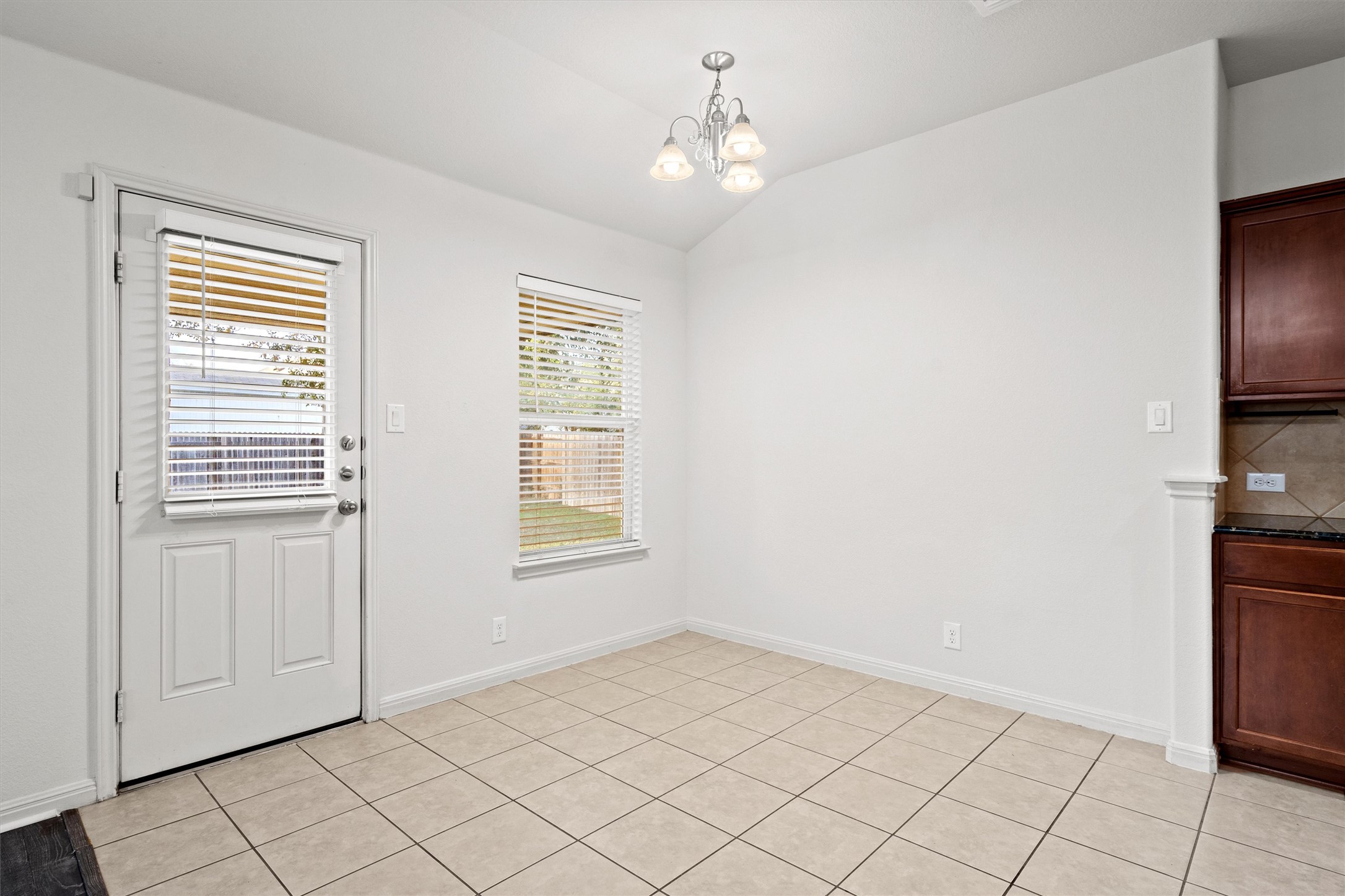 1612 Musket Valley Trail Austin, TX 78754 - Photo 13 of 34 a view of an empty room with window