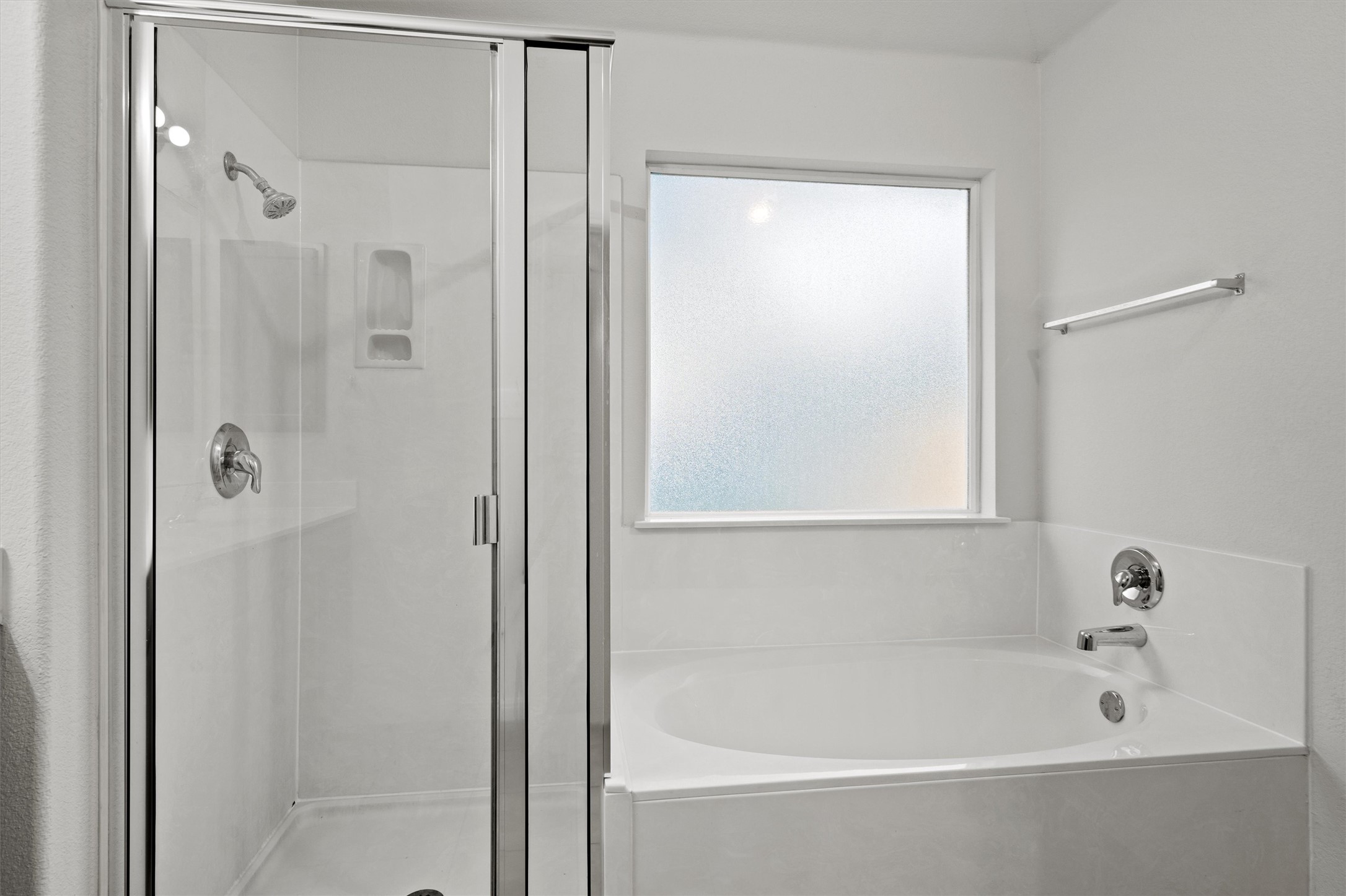 1612 Musket Valley Trail Austin, TX 78754 - Photo 22 of 34 a white bath tub sitting next to a shower