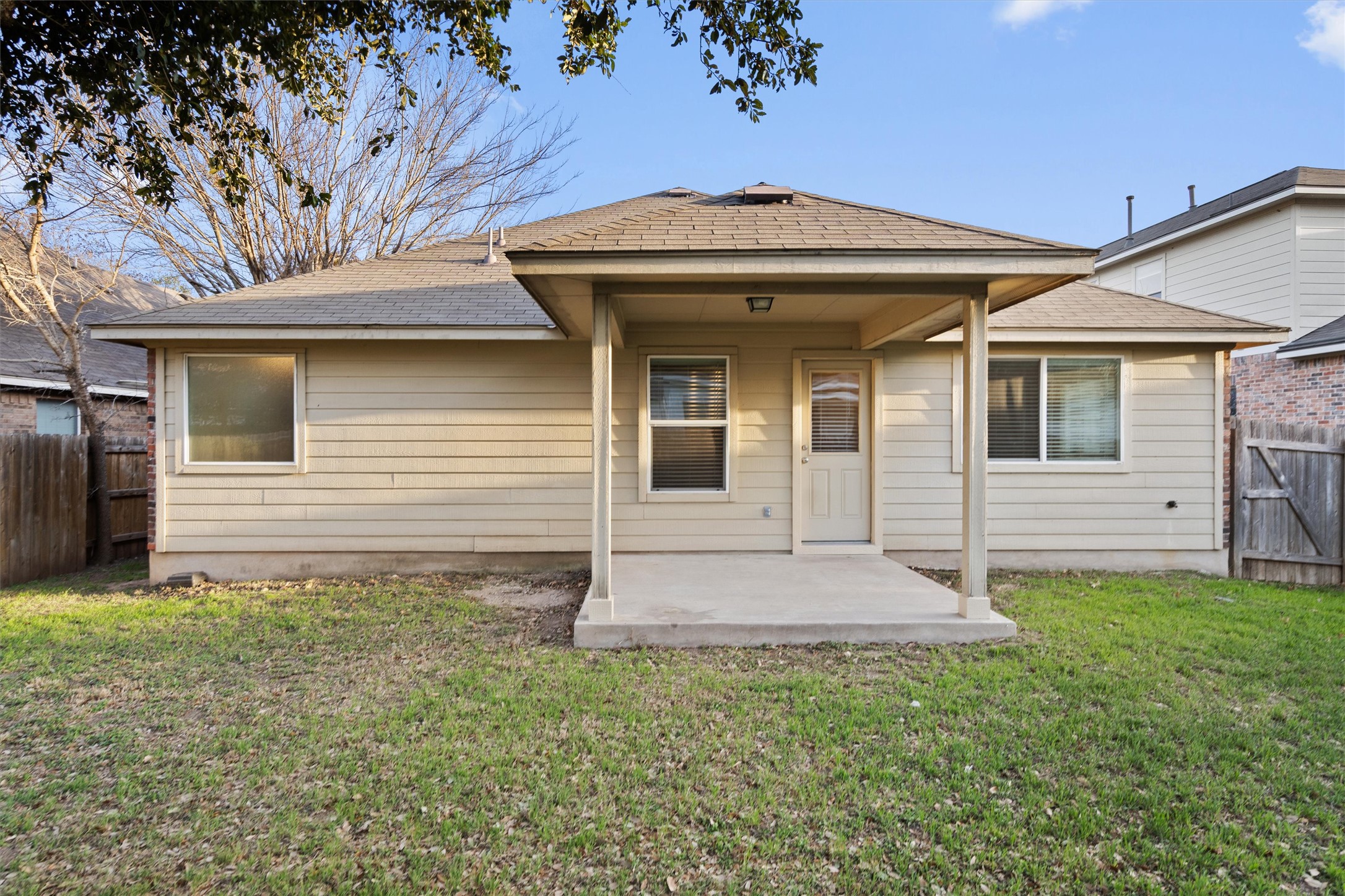 1612 Musket Valley Trail Austin, TX 78754 - Photo 33 of 34 a front view of a house with garden