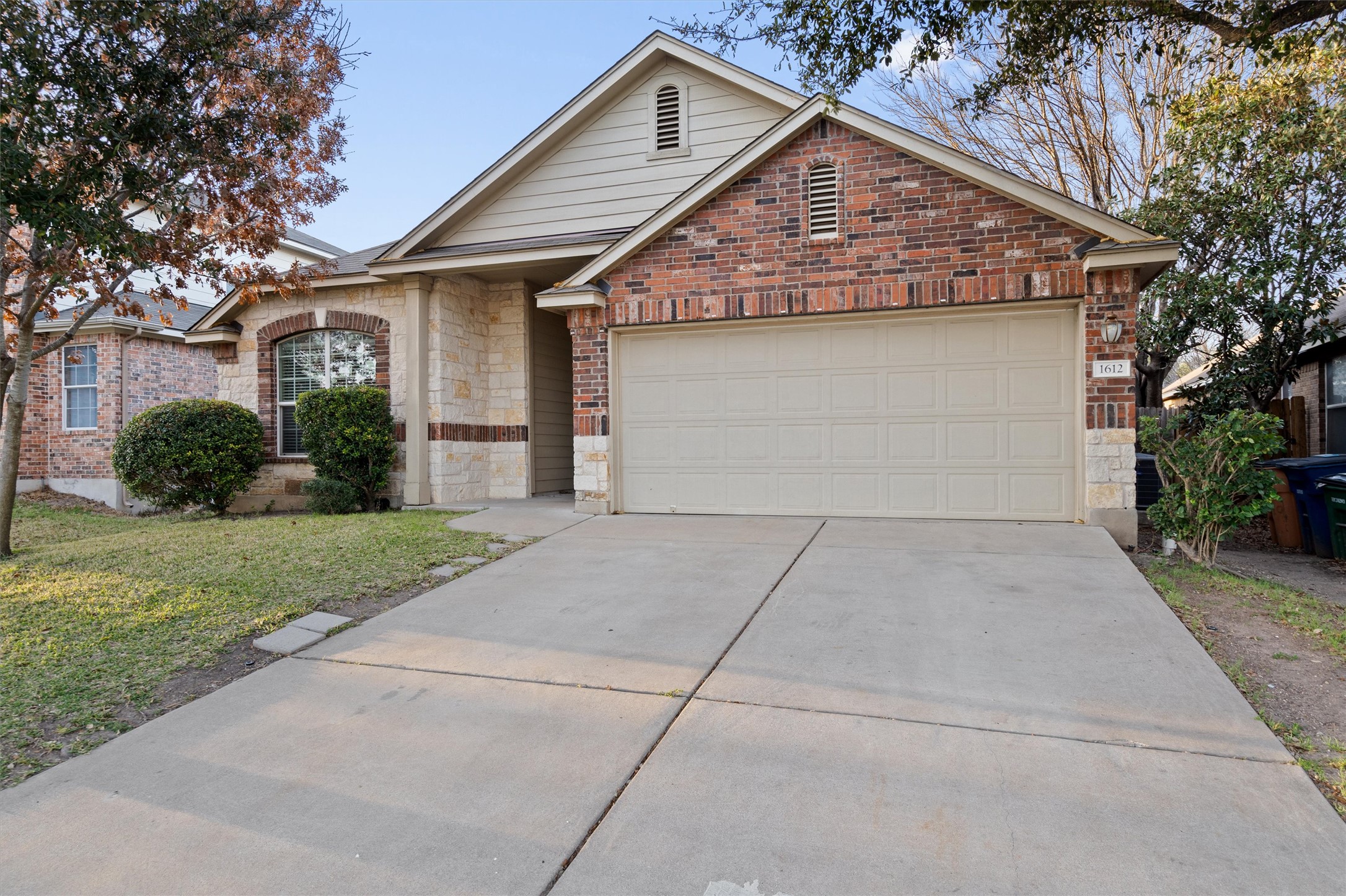 1612 Musket Valley Trail Austin, TX 78754 - Photo 4 of 34 a view of a house with a yard