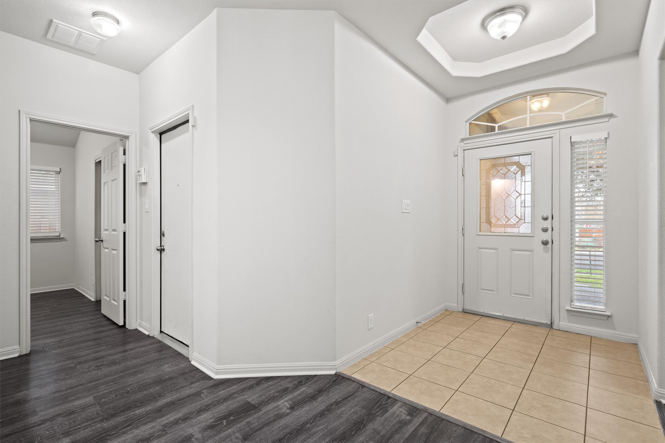 1612 Musket Valley Trail Austin, TX 78754 - Photo 6 of 34 wooden floor in an empty room with a workspace