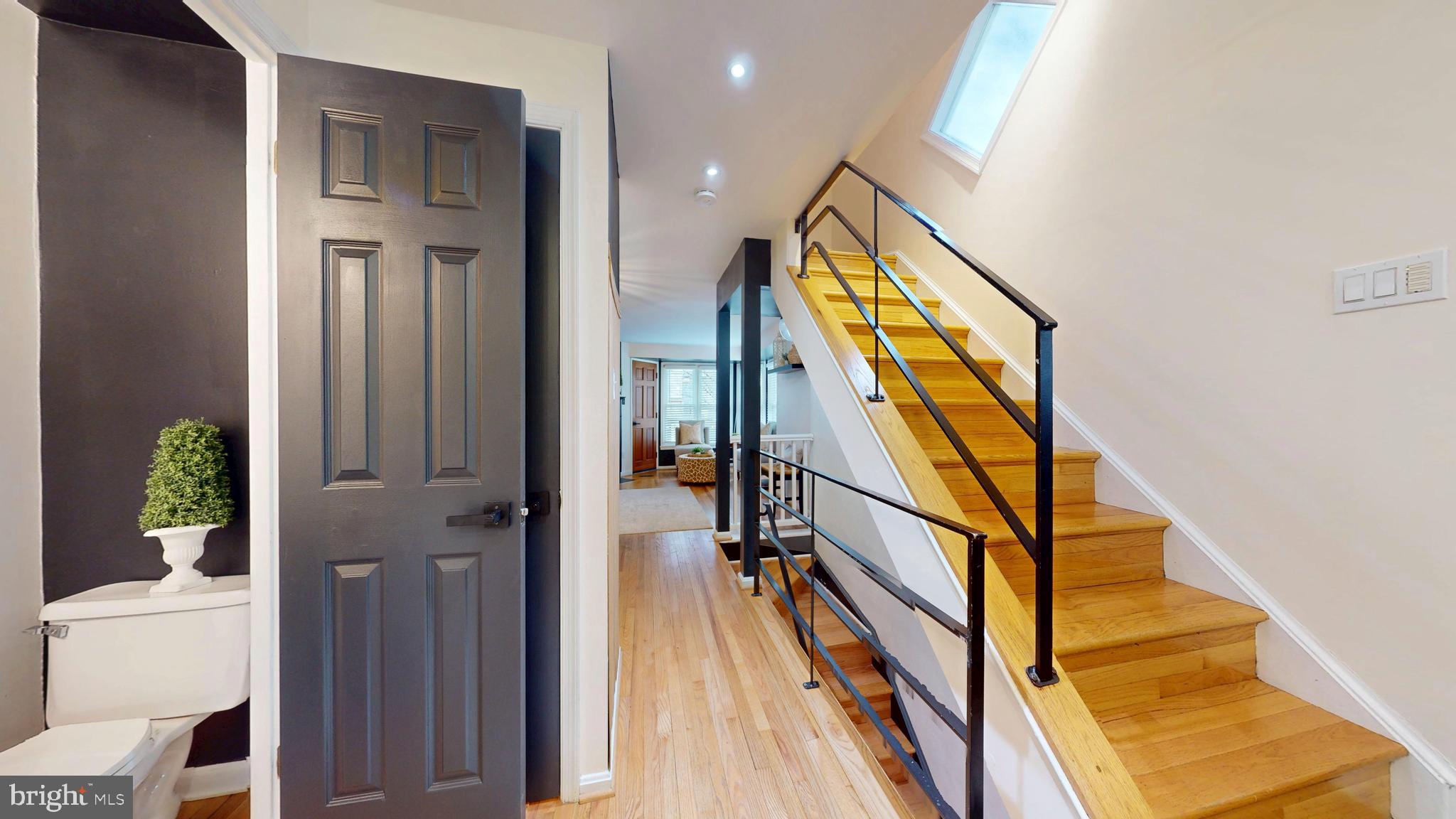 1771 Whisperhill Drive Reston, VA 20194 - Photo 11 of 44 a view of an entryway with wooden floor and door