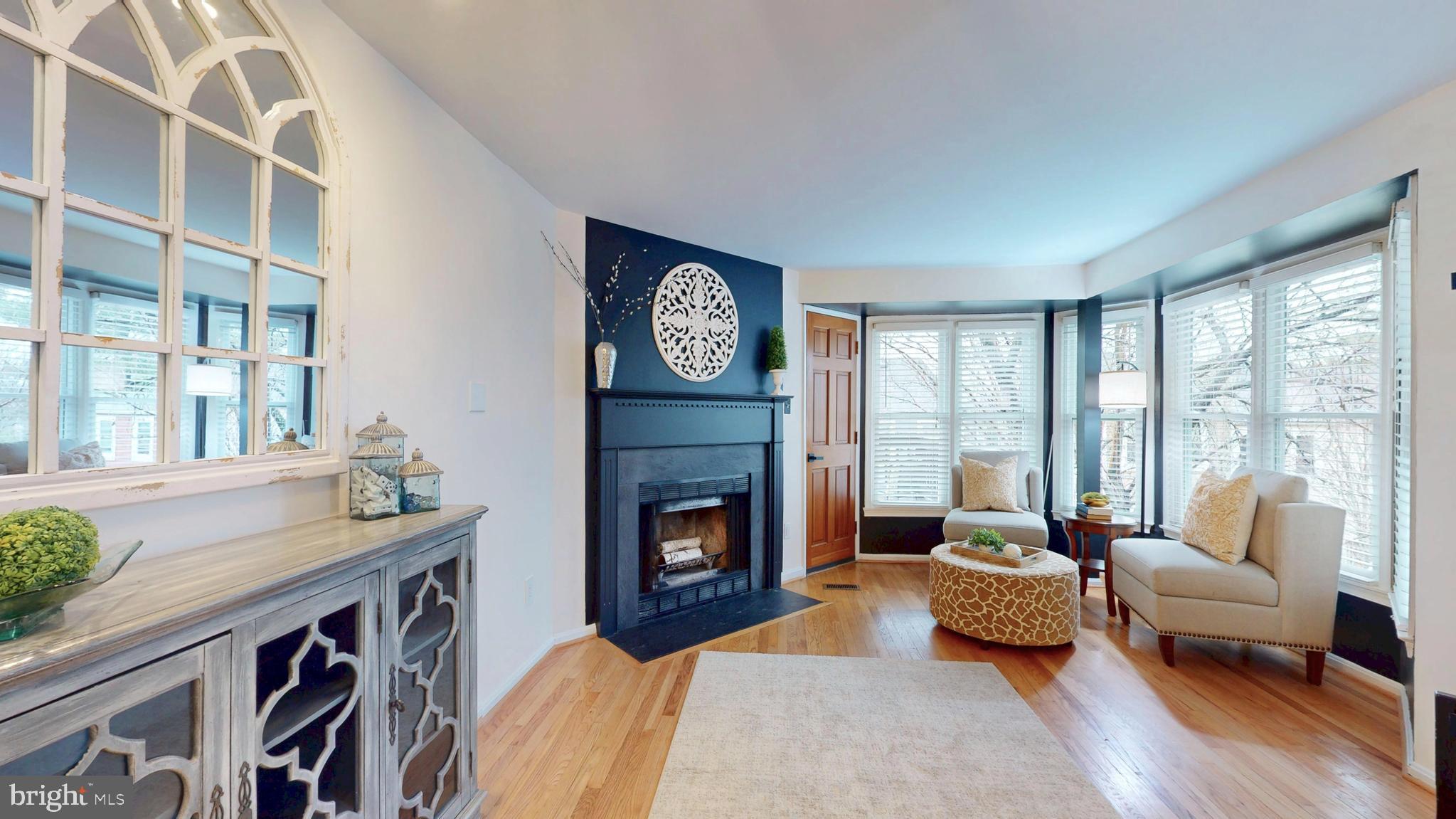 1771 Whisperhill Drive Reston, VA 20194 - Photo 12 of 44 a living room with furniture and a fireplace