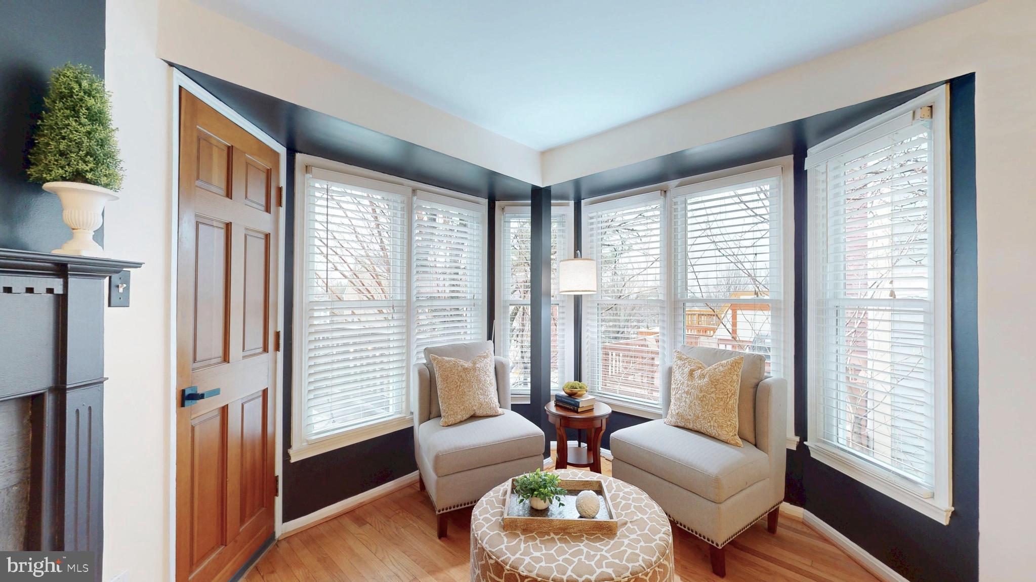 1771 Whisperhill Drive Reston, VA 20194 - Photo 17 of 44 a living room with furniture and a large window
