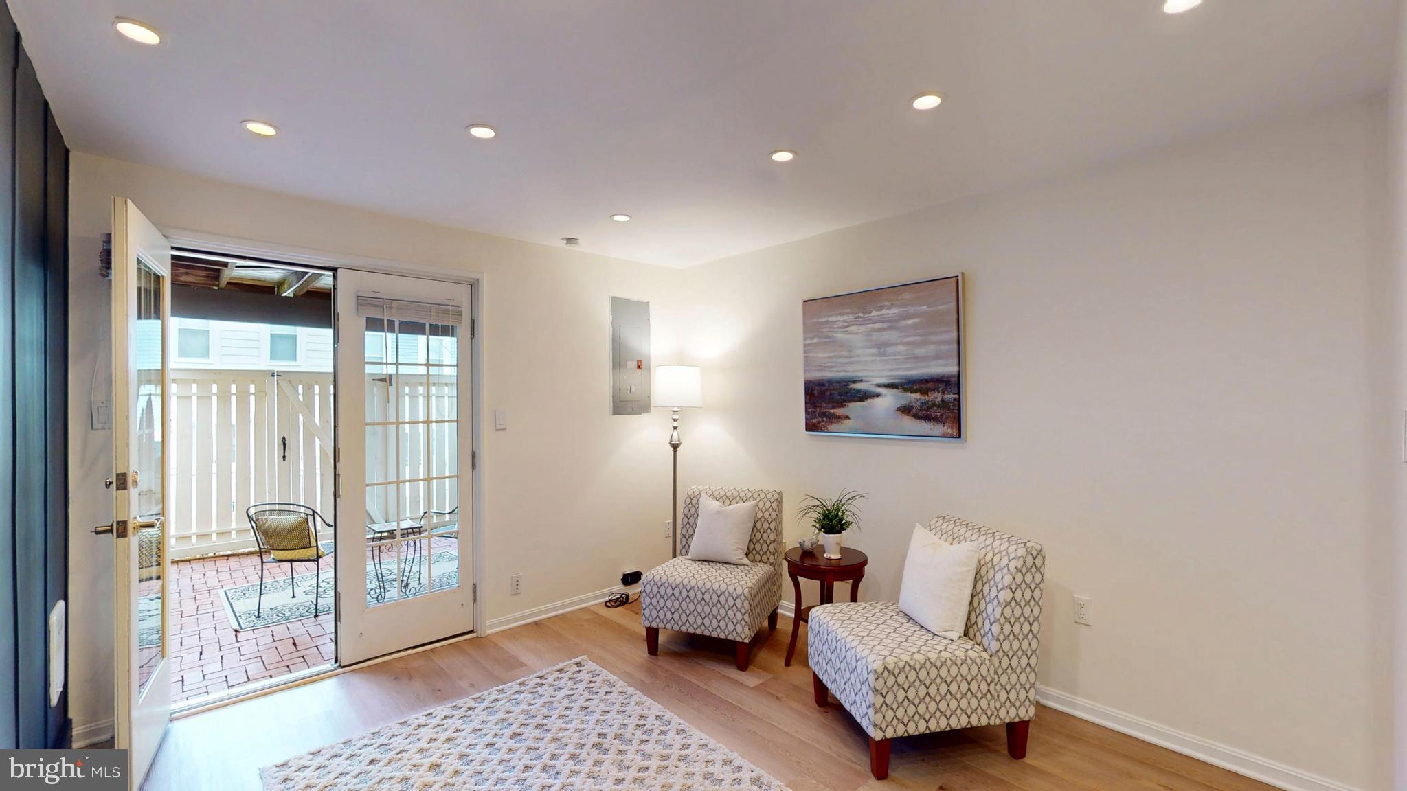 1771 Whisperhill Drive Reston, VA 20194 - Photo 34 of 44 a living room with furniture and a window