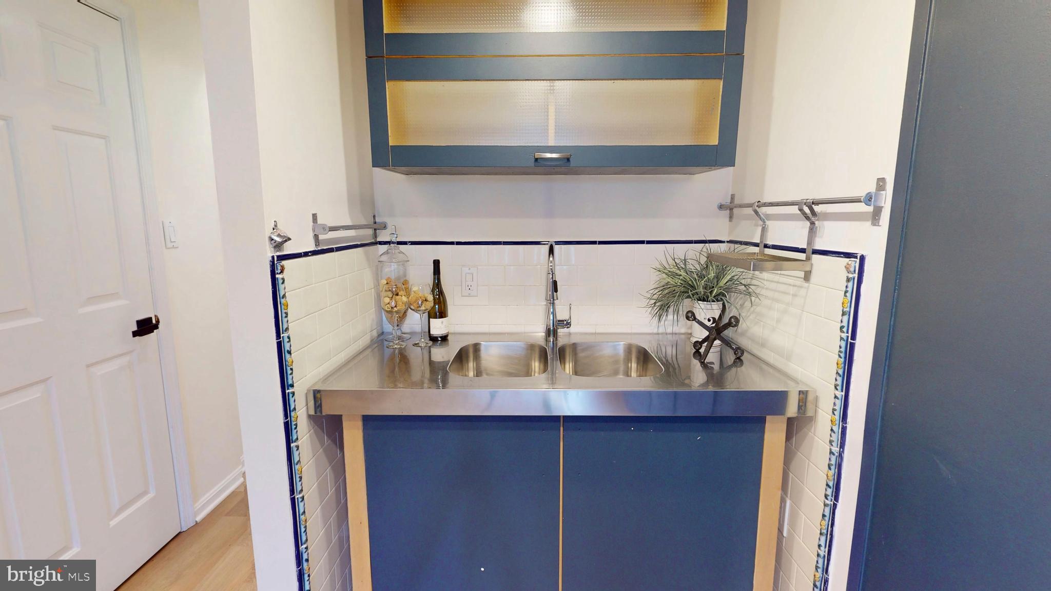 1771 Whisperhill Drive Reston, VA 20194 - Photo 37 of 44 a bathroom with a sink and a mirror
