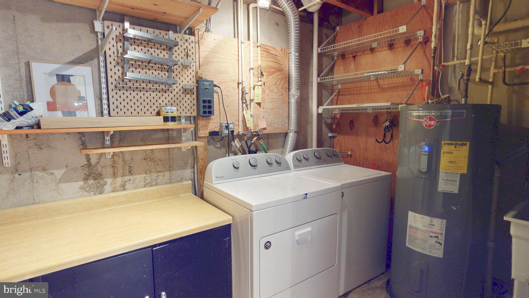 1771 Whisperhill Drive Reston, VA 20194 - Photo 38 of 44 a utility room with dryer and washer