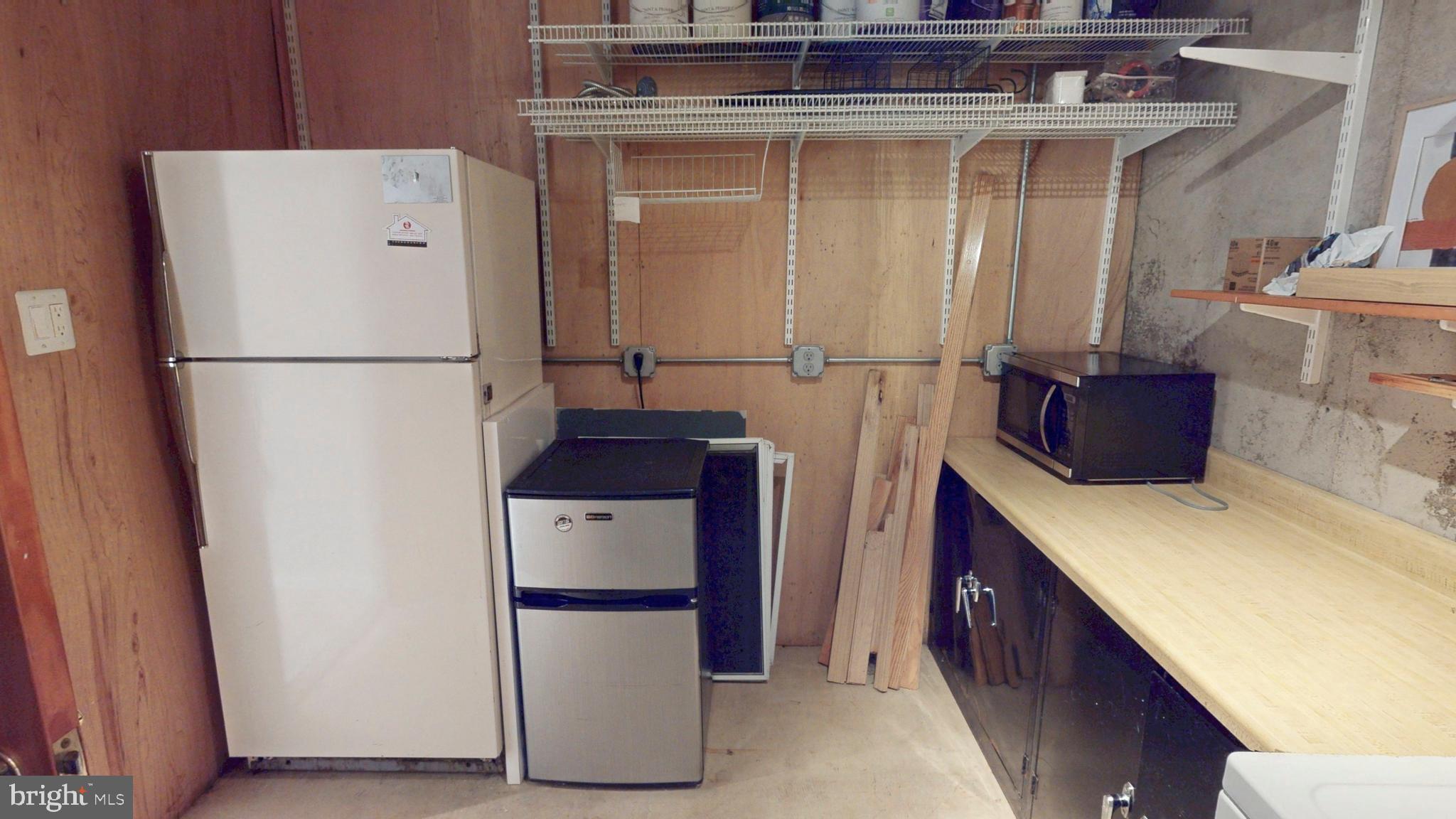 1771 Whisperhill Drive Reston, VA 20194 - Photo 39 of 44 a kitchen with a refrigerator and a stove