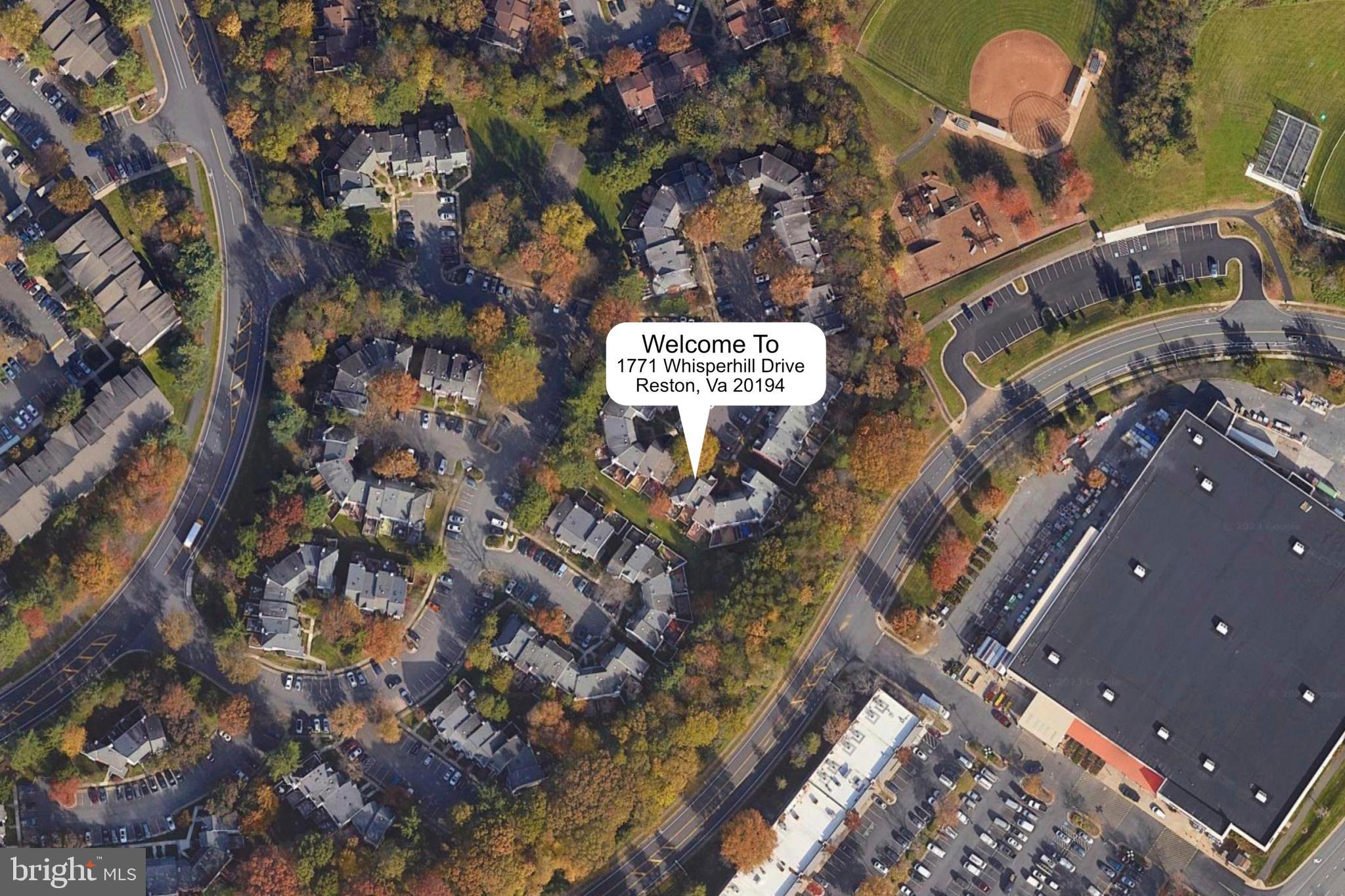 1771 Whisperhill Drive Reston, VA 20194 - Photo 44 of 44 a sign that is on a pole