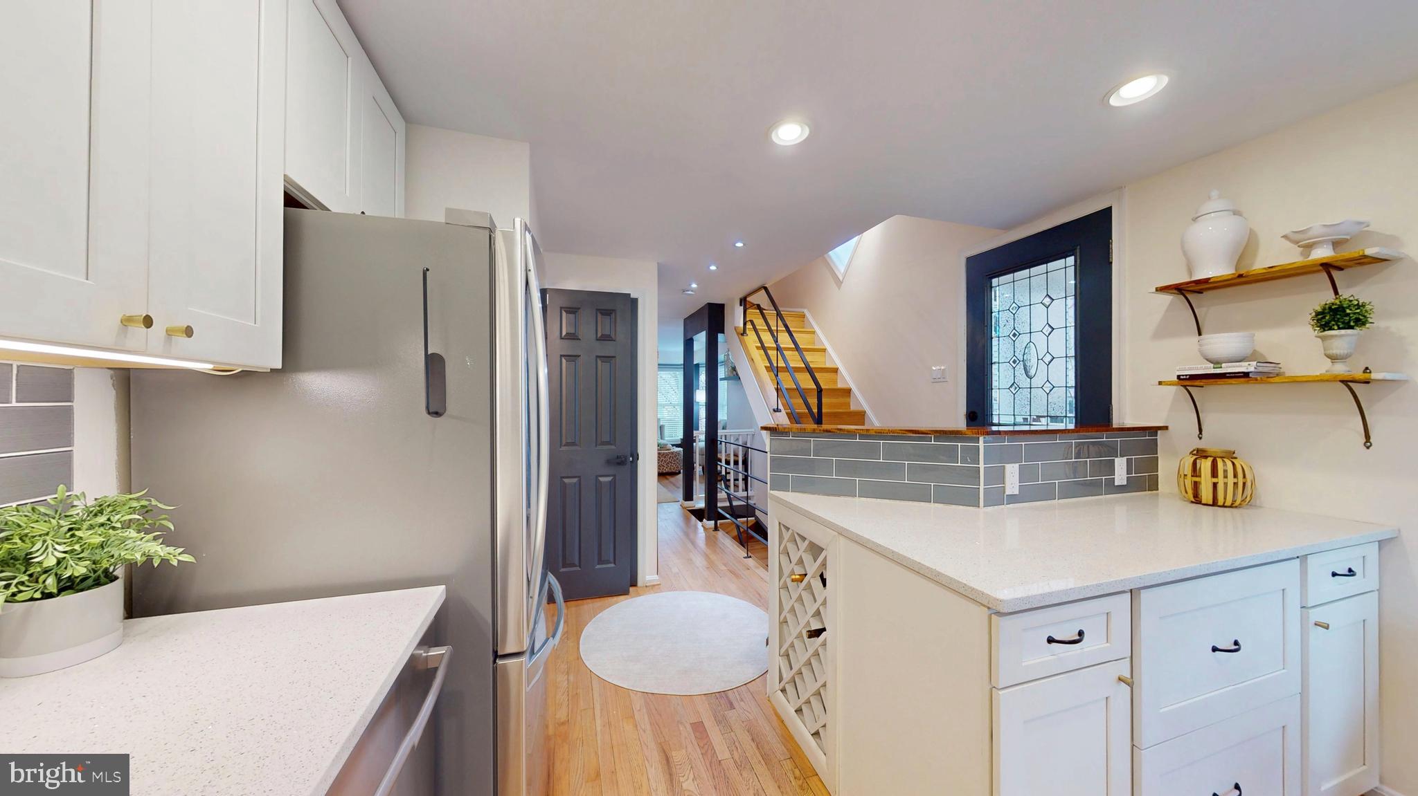 1771 Whisperhill Drive Reston, VA 20194 - Photo 10 of 44 a bathroom with a tub sink and mirror