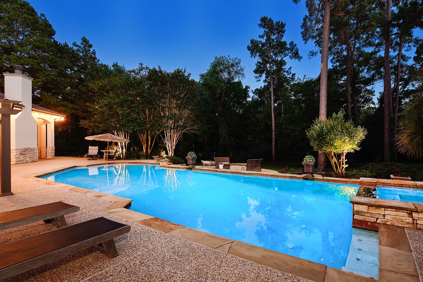 119 Angel Leaf Road The Woodlands, TX 77380 - Photo 41 of 50 a view of a swimming pool with a lounge chairs