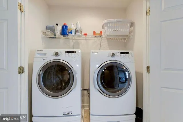 a utility room with dryer and washer