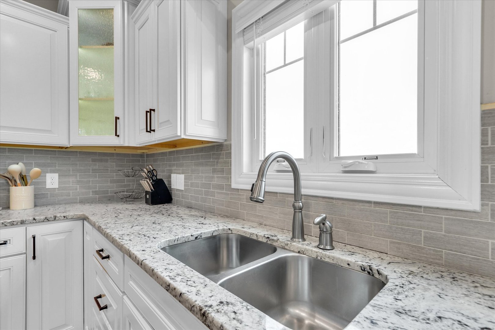 1010 Declaration Drive Savoy, IL 61874 - Photo 20 of 54 a kitchen with a sink cabinets and window