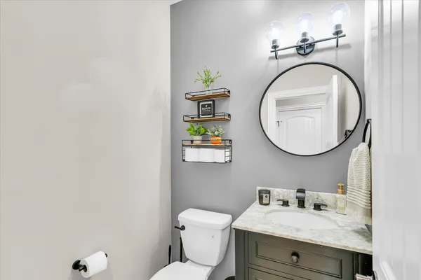 a bed room with a bed and a window