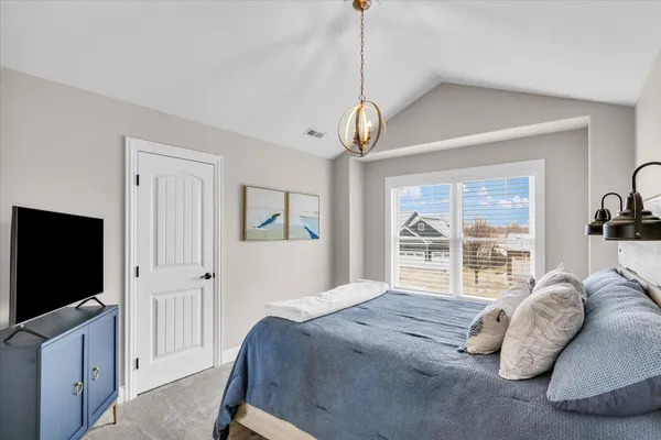 a bathroom with a sink double vanity and a mirror