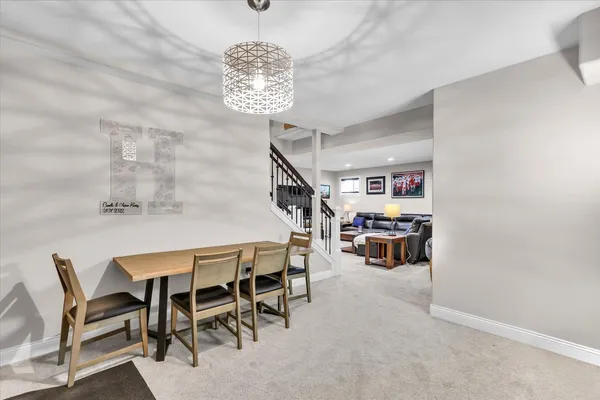 a view of a house with a yard and garage