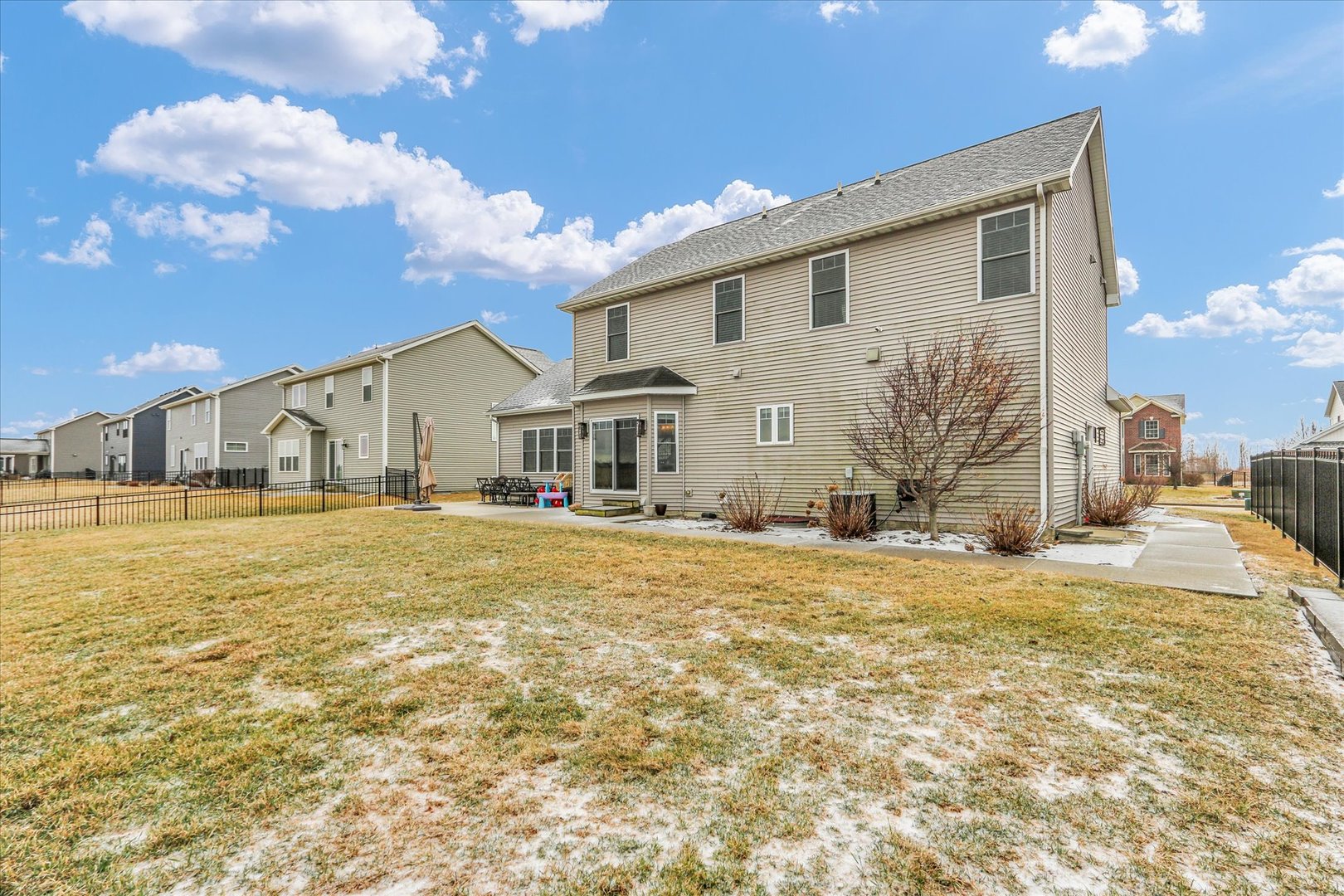 1010 Declaration Drive Savoy, IL 61874 - Photo 50 of 54 a front view of a house with a yard