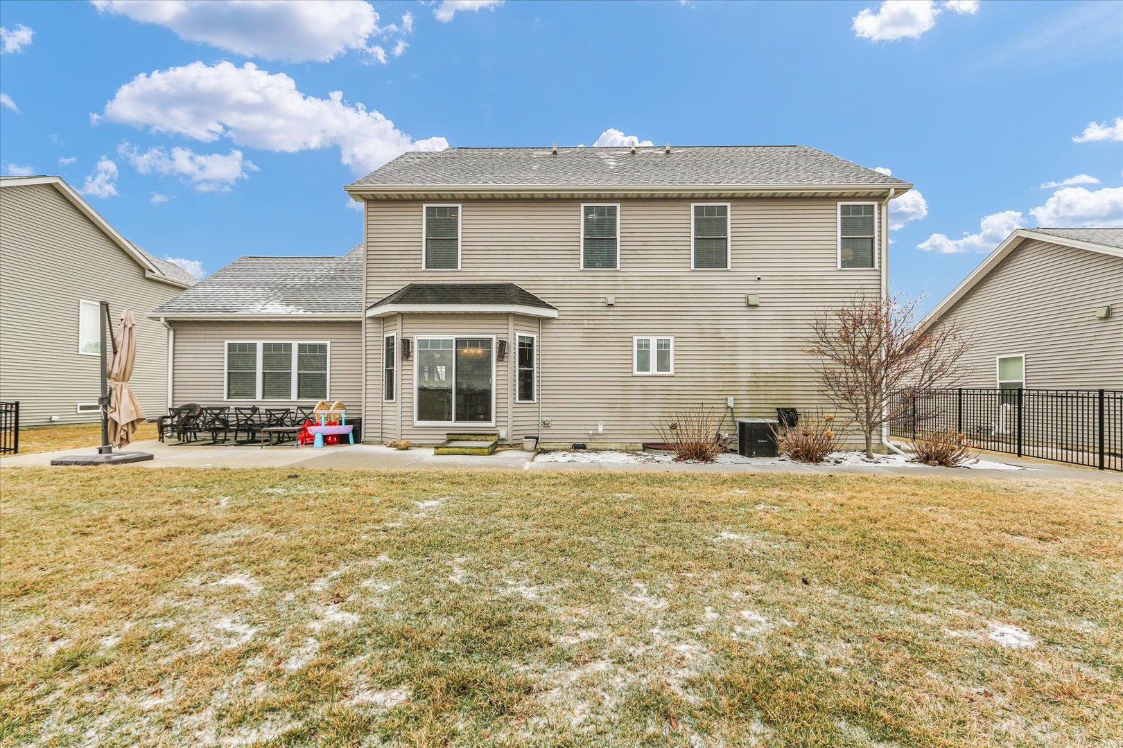 1010 Declaration Drive Savoy, IL 61874 - Photo 51 of 54 a front view of a house with a yard and garage