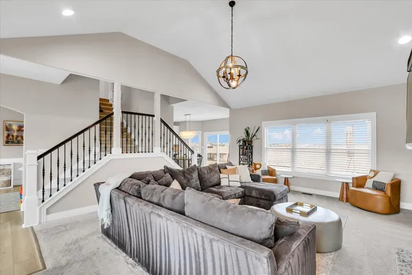 a view of a livingroom with furniture and windows