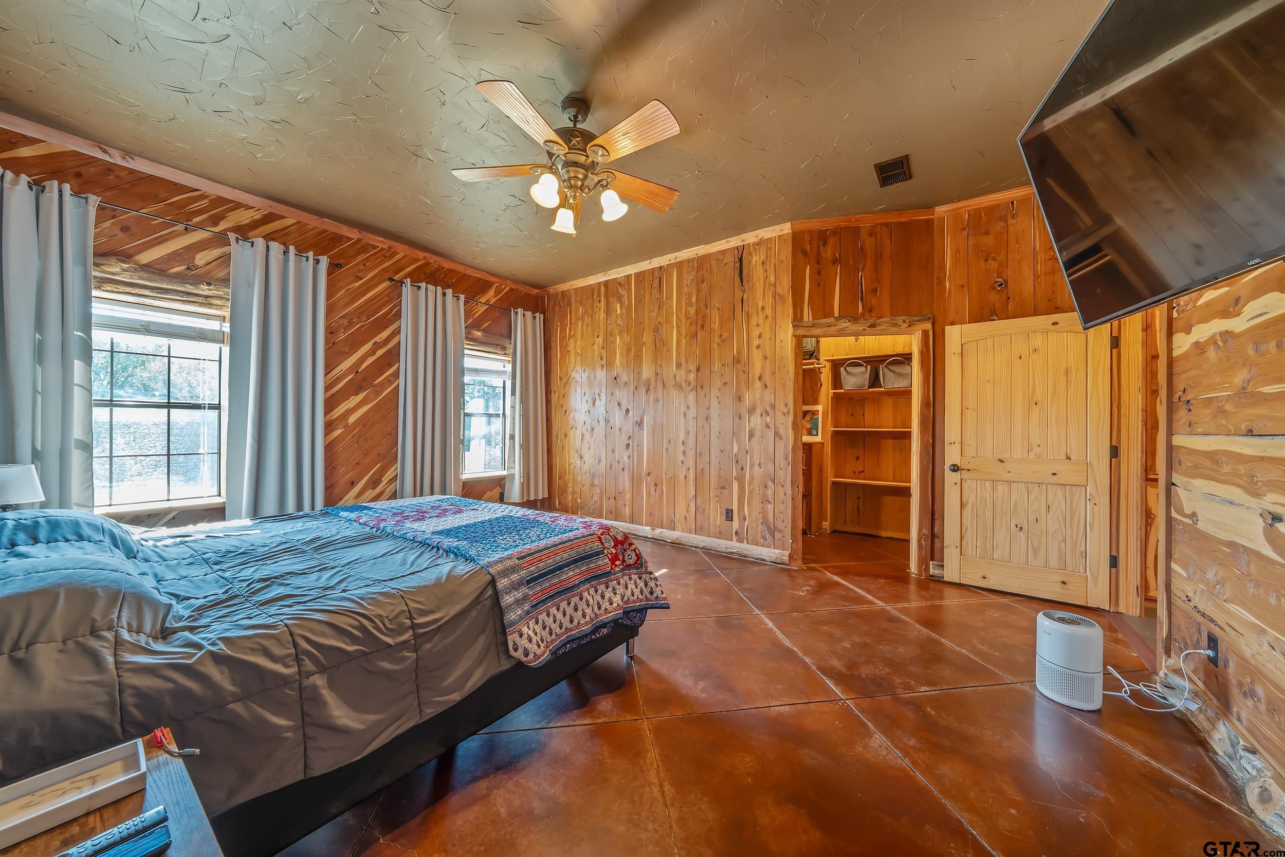 2600 Van Meter Road Kilgore, TX 75662 - Photo 19 of 48 a bedroom with a bed dresser and a window
