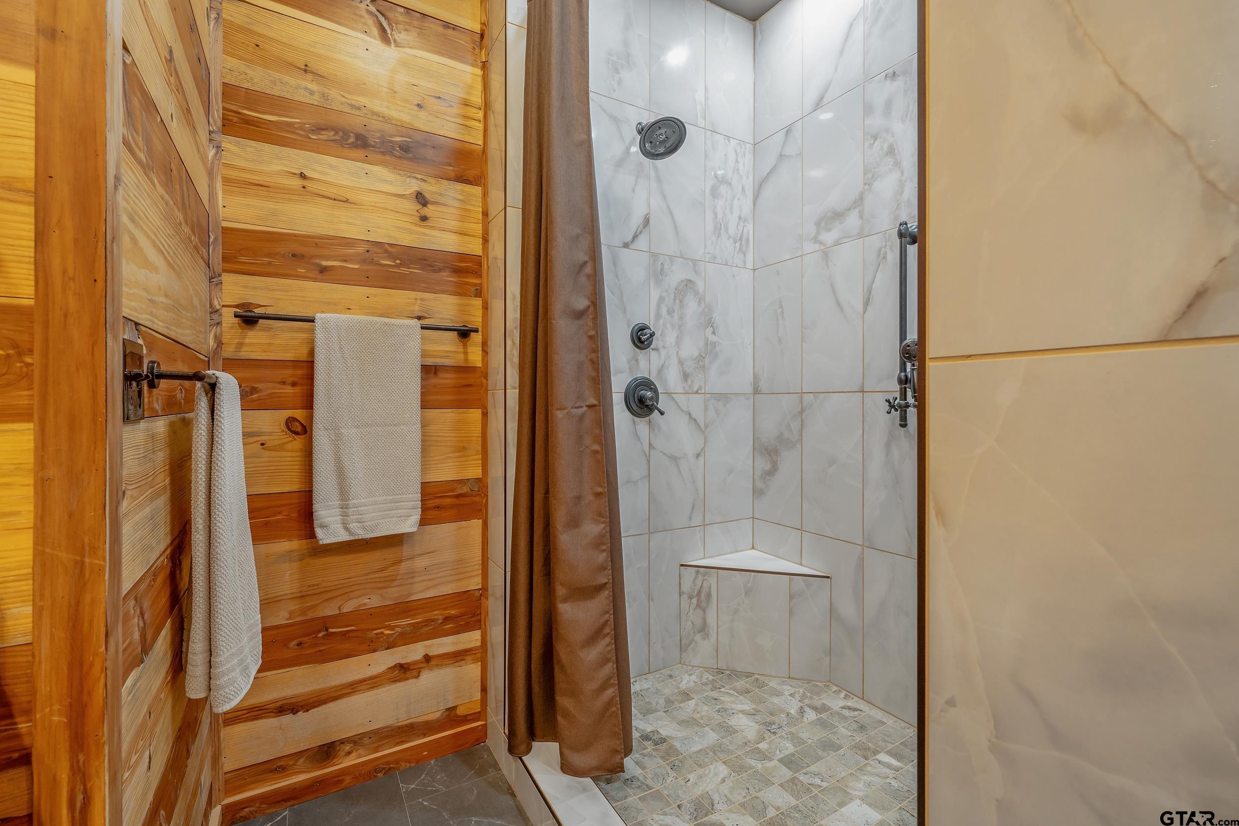 2600 Van Meter Road Kilgore, TX 75662 - Photo 23 of 48 a bathroom with a shower and toilet