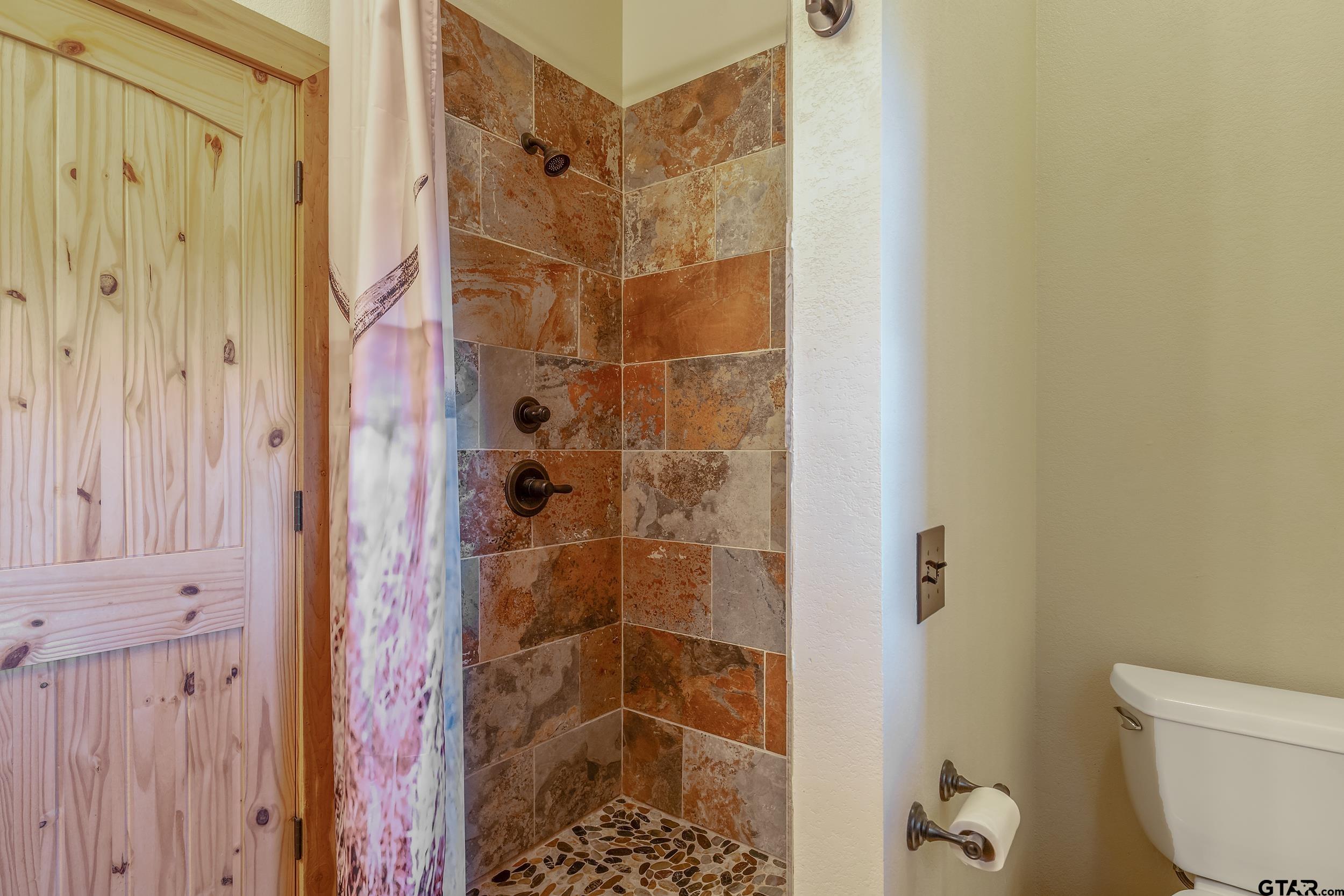 2600 Van Meter Road Kilgore, TX 75662 - Photo 30 of 48 a bathroom with a shower