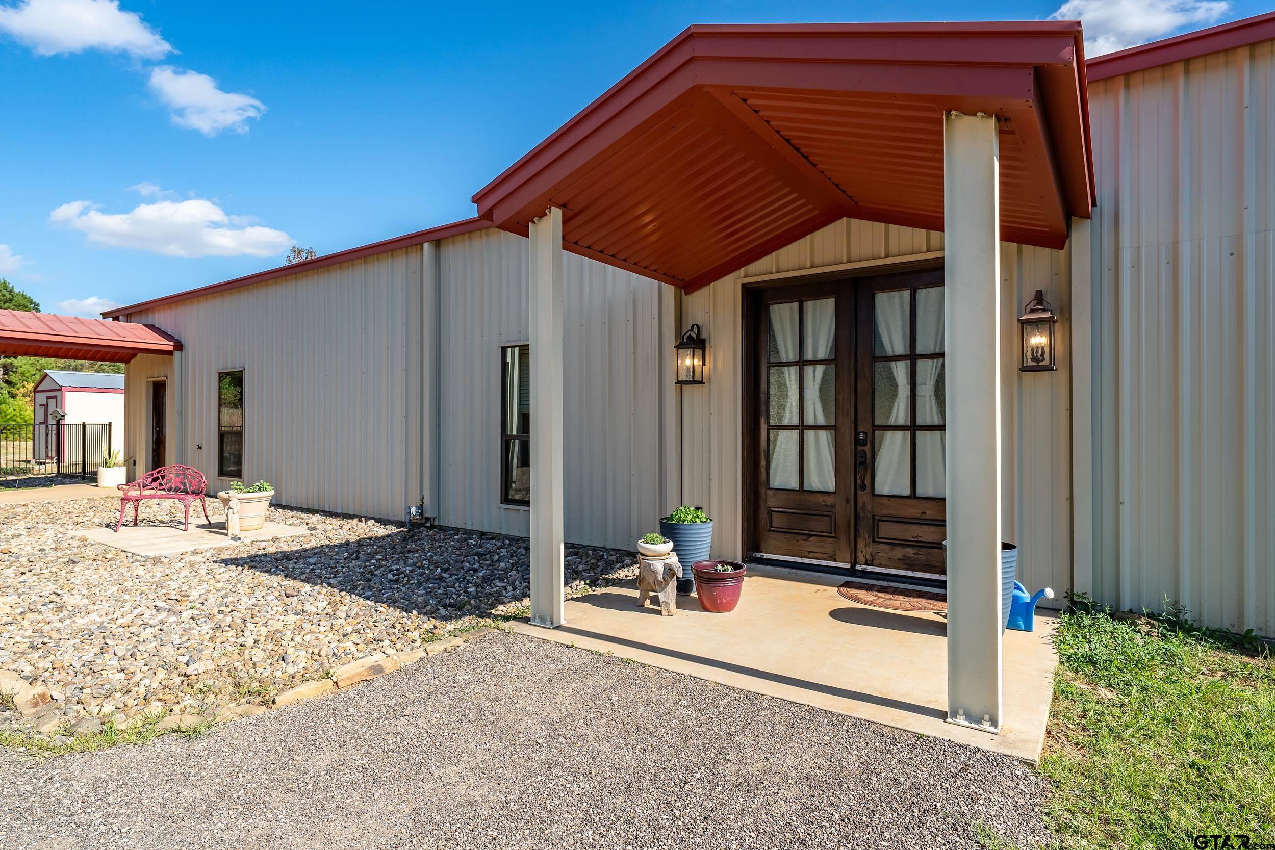 2600 Van Meter Road Kilgore, TX 75662 - Photo 4 of 48 a front view of a house
