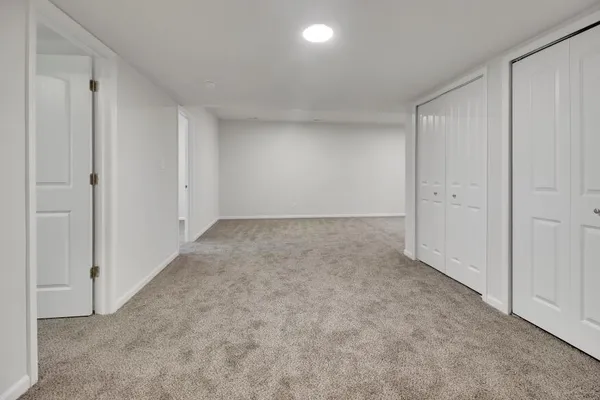 a view of a lake with a big yard