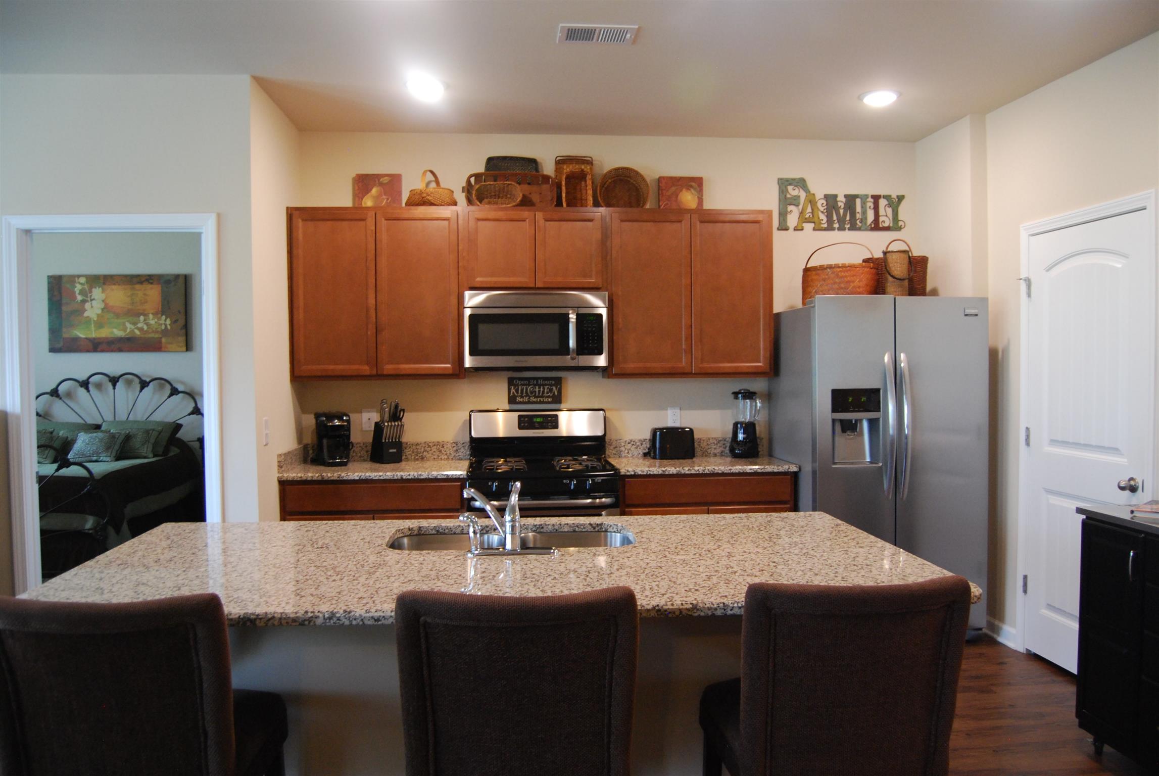 651 Prominence Road Columbia, TN 38401 - Photo 10 of 26 island has overhang for extra dining space.