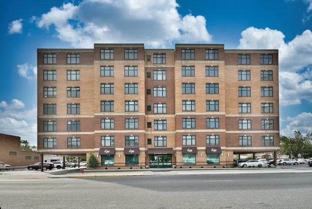 a tall building sitting on the side of a street