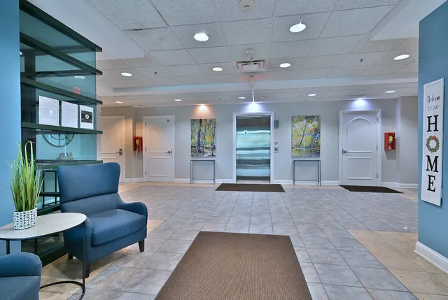 a view of a livingroom with furniture and a couch