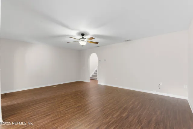 a kitchen with a sink stove and refrigerator