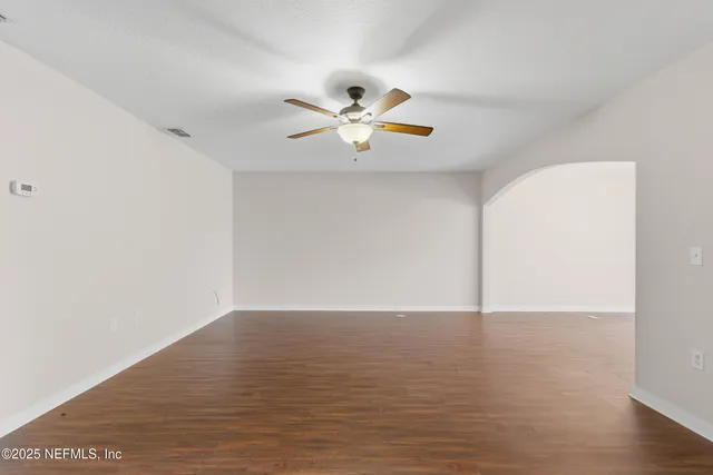 a kitchen that has a sink a counter space and a window