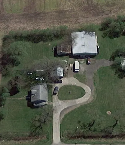 an aerial view of a fireplace with a yard