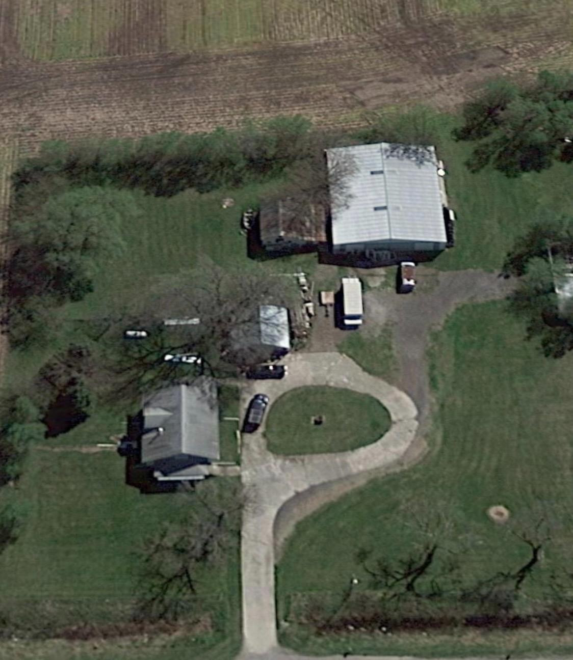1103 Highway 41 Morocco, IN 47963 - Photo 5 of 8 an aerial view of a fireplace with a yard