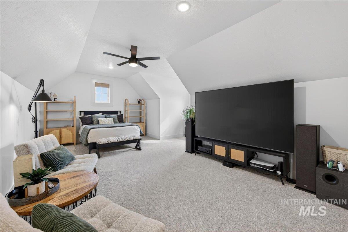 24853 Haflinger Way Middleton, ID 83644 - Photo 39 of 49 Bedroom featuring light carpet, ceiling fan, and recessed lighting