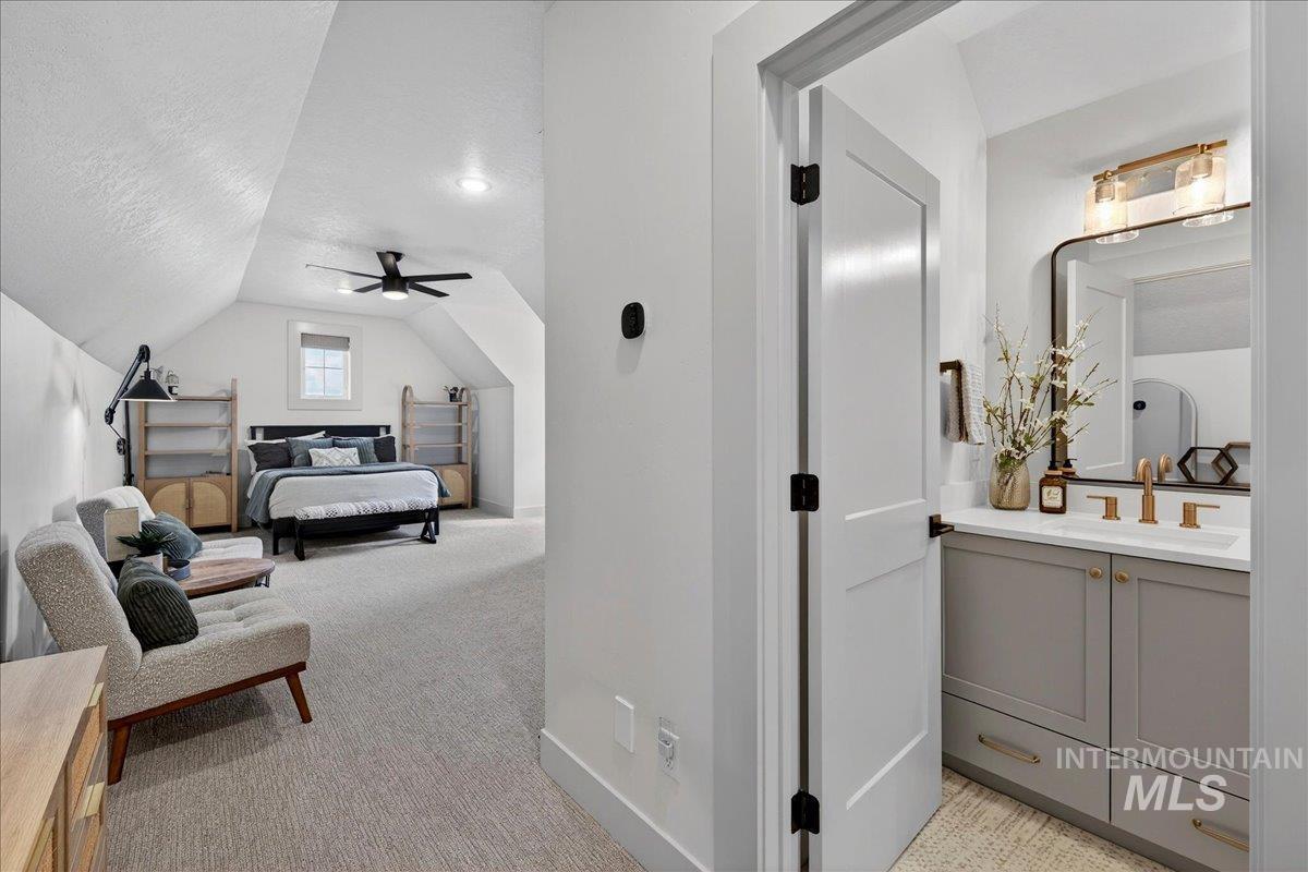 24853 Haflinger Way Middleton, ID 83644 - Photo 40 of 49 Bedroom with baseboards and light colored carpet