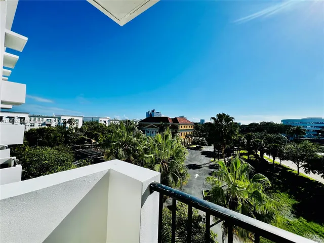 a view of a balcony with an outdoor space