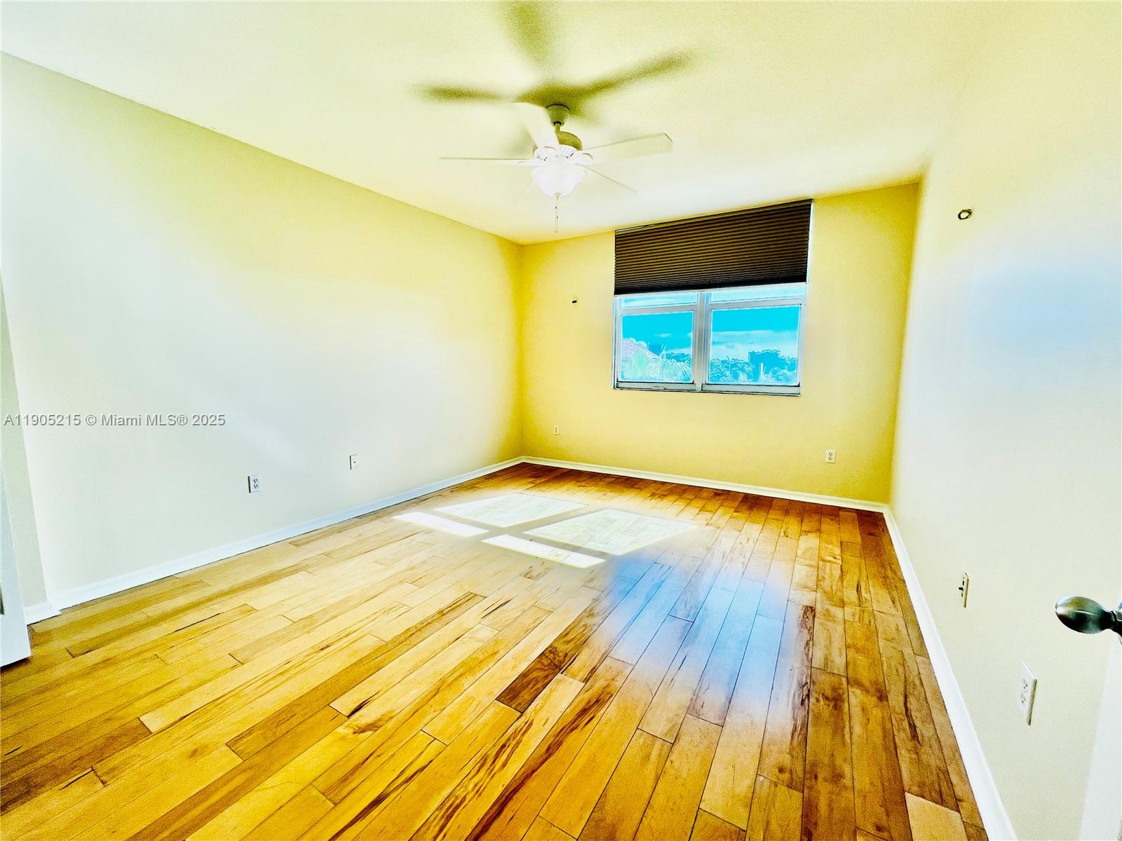 2421 Northeast 65th Street, Unit 506 Fort Lauderdale, FL 33308 - Photo 26 of 59 a view of a big room with wooden floor