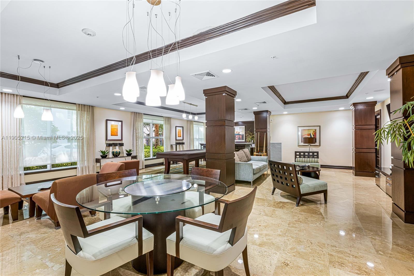 2421 Northeast 65th Street, Unit 506 Fort Lauderdale, FL 33308 - Photo 40 of 59 a living room with fireplace furniture and a large window