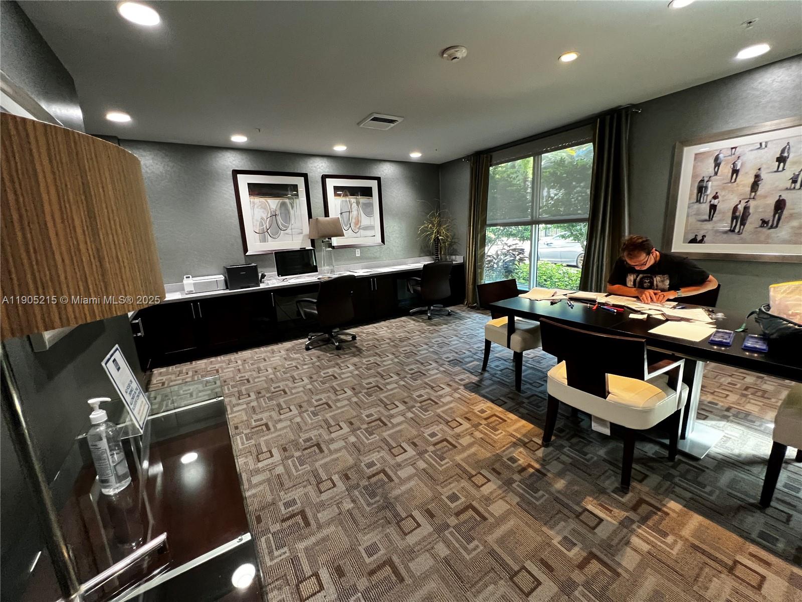 2421 Northeast 65th Street, Unit 506 Fort Lauderdale, FL 33308 - Photo 45 of 59 a living room with furniture and a large window