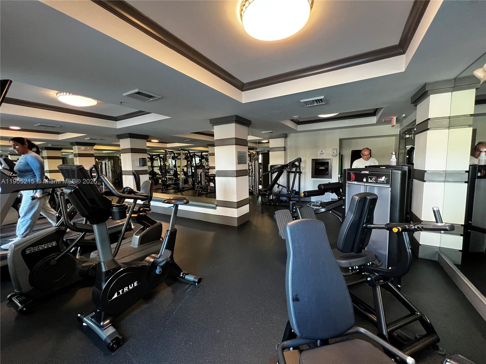2421 Northeast 65th Street, Unit 506 Fort Lauderdale, FL 33308 - Photo 46 of 59 a view of a room with gym equipment